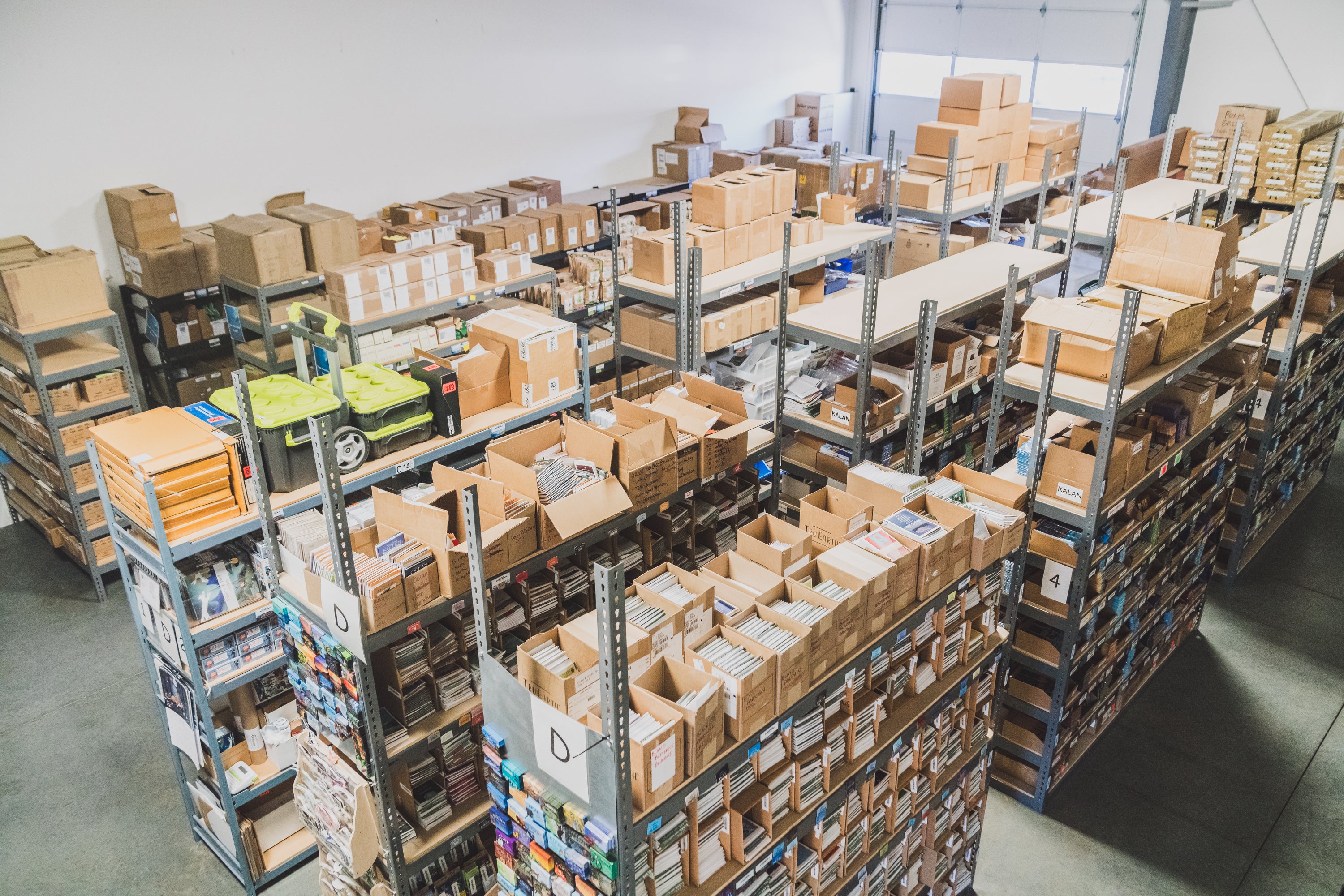 Overhead view of the Collective Pallet warehouse featuring organized inventory shelving, ecommerce storage systems, and fulfillment operations inside the Bend, Oregon facility.